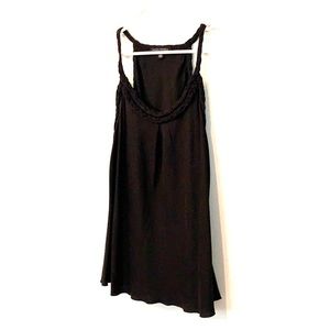 Black sleeveless blouse with braided detailing
